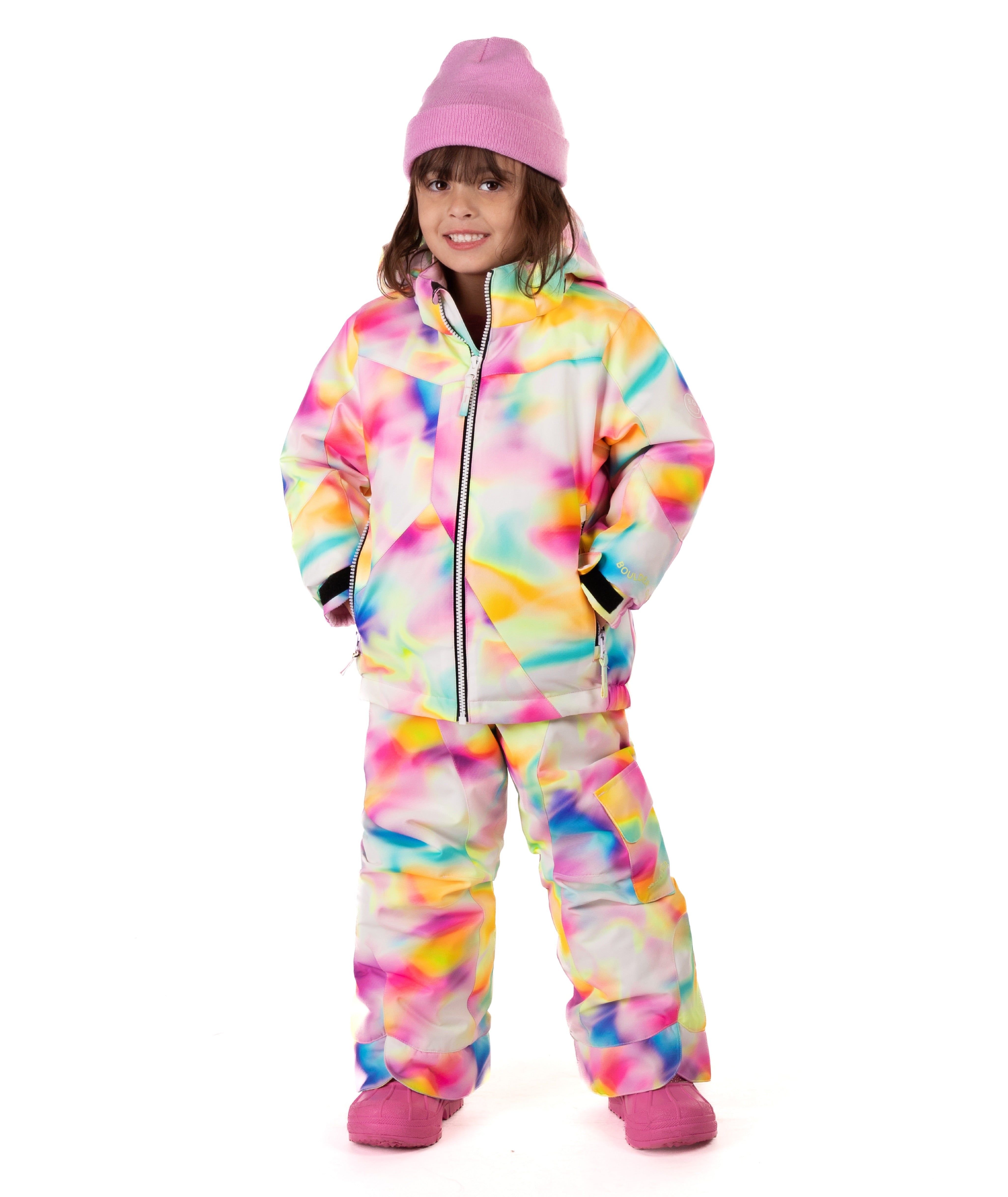 Child wearing a colorful colorful tie-dye winter jacket on a white background. 