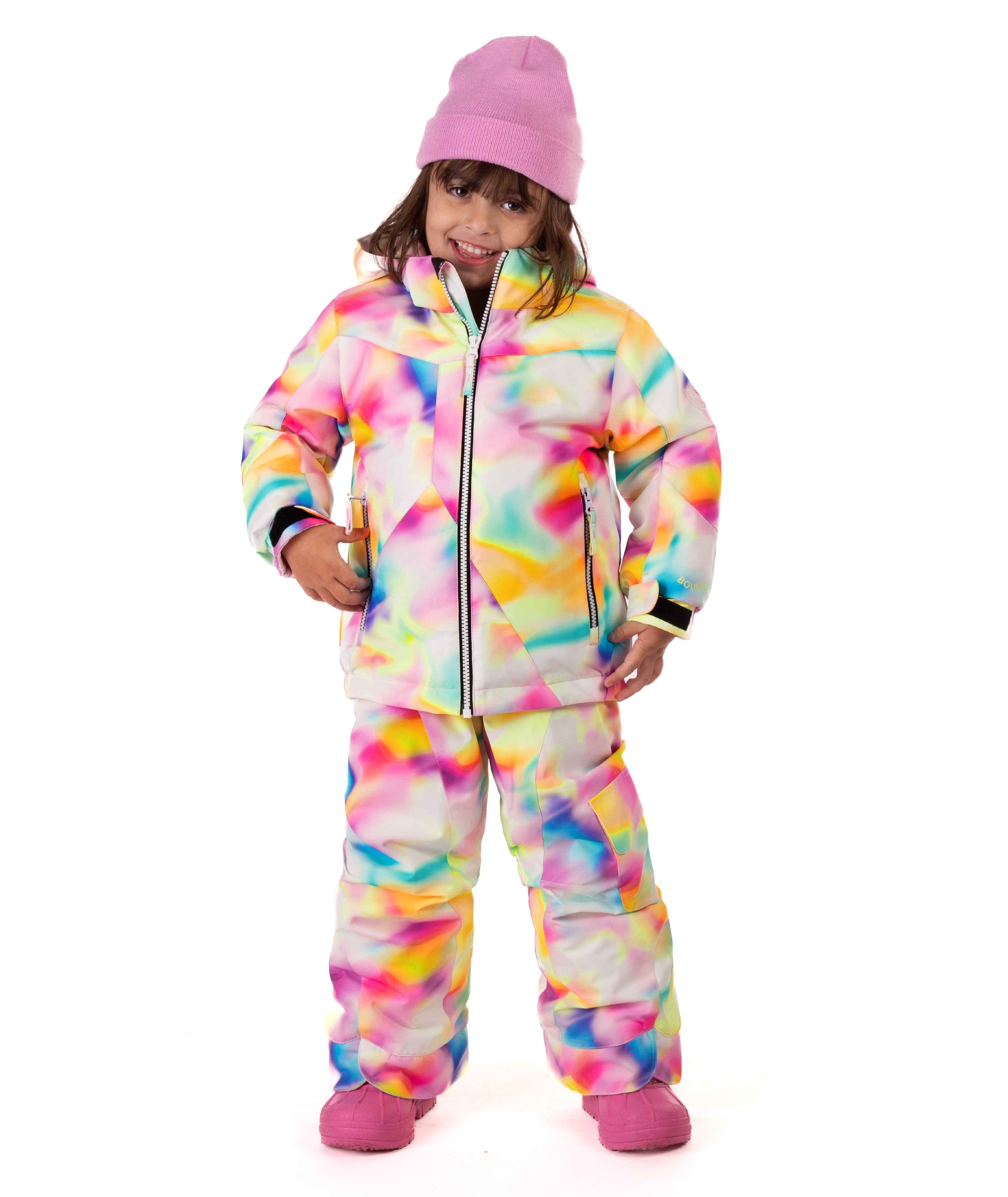 Child wearing a colorful colorful tie-dye winter jacket on a white background. 
