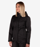 Person wearing a black jacket on a white background