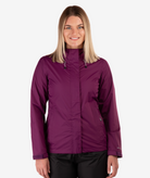 Woman wearing a purple jacket on a white background