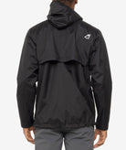 back of a black rain jacket with a brand logo on the back, worn by a person.