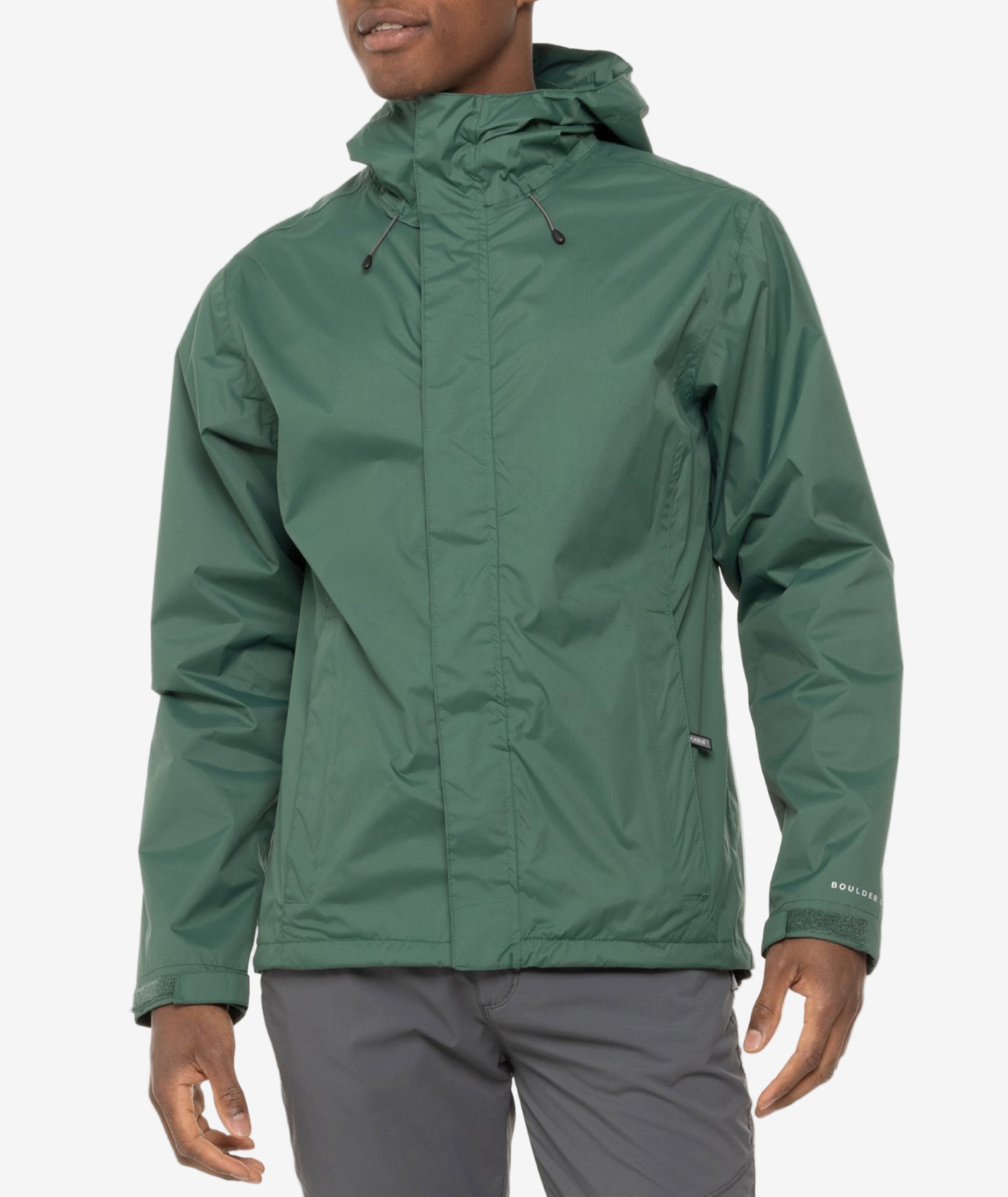 Person wearing a green rain jacket on a white background