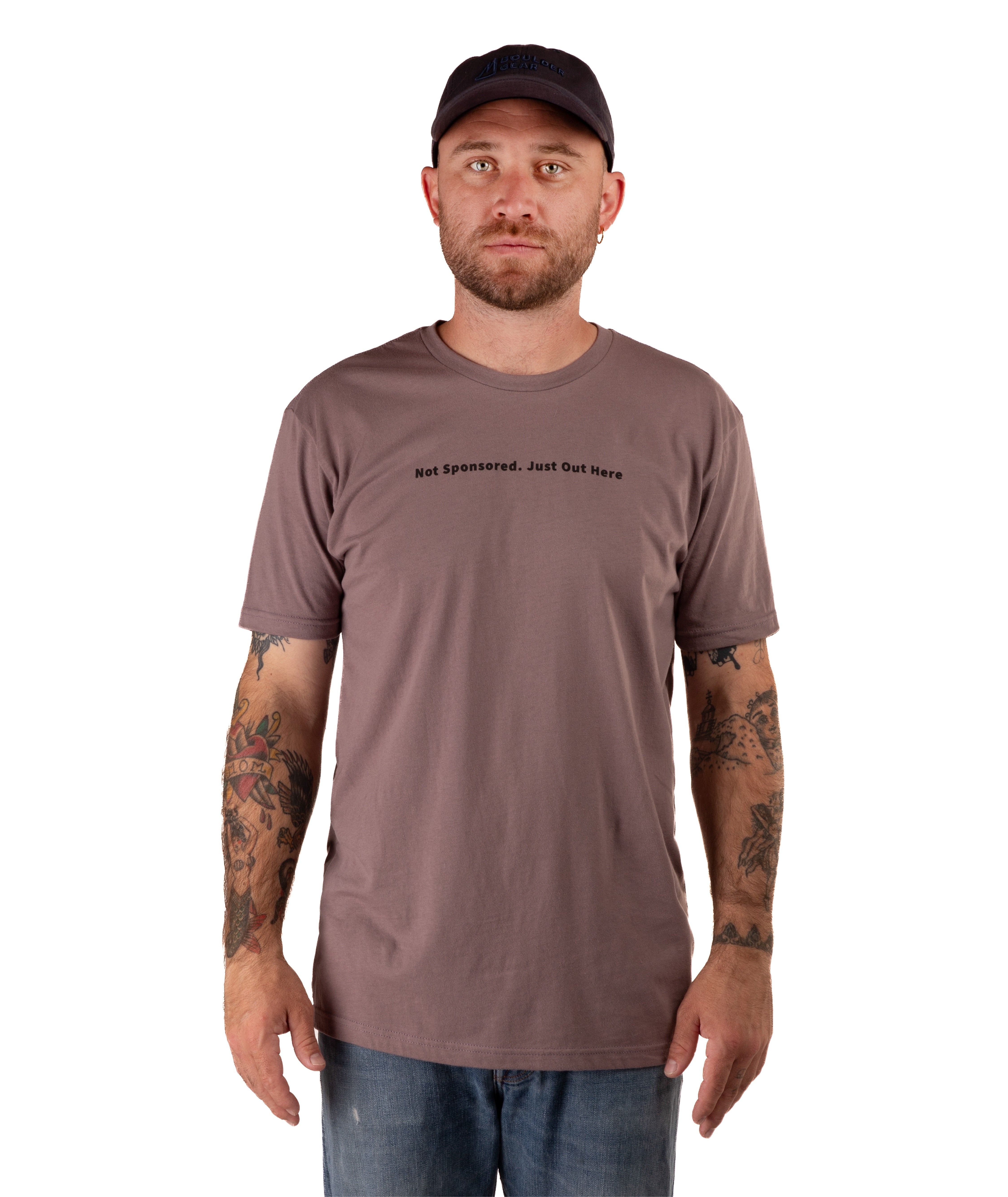 man in a brown shirt with black text and a black hat on a white background