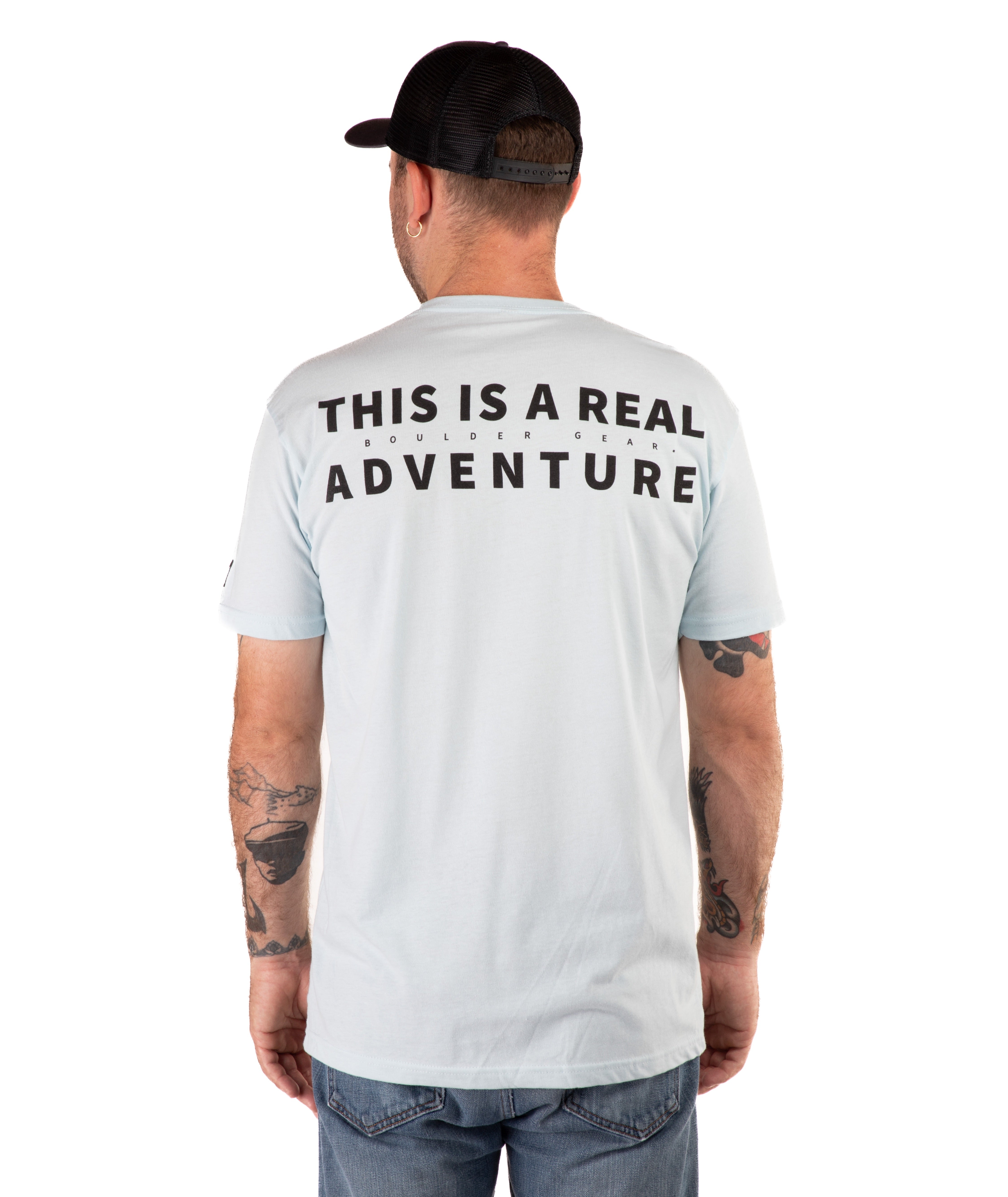 back of a Man wearing a light blue t-shirt with text and a black cap on a white background