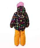 Child wearing a colorful floral patterned jacket on a white background