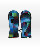Colorful abstract-patterned mittens on a white background