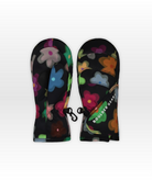 Pair of colorful mittens with floral patterns on a white background