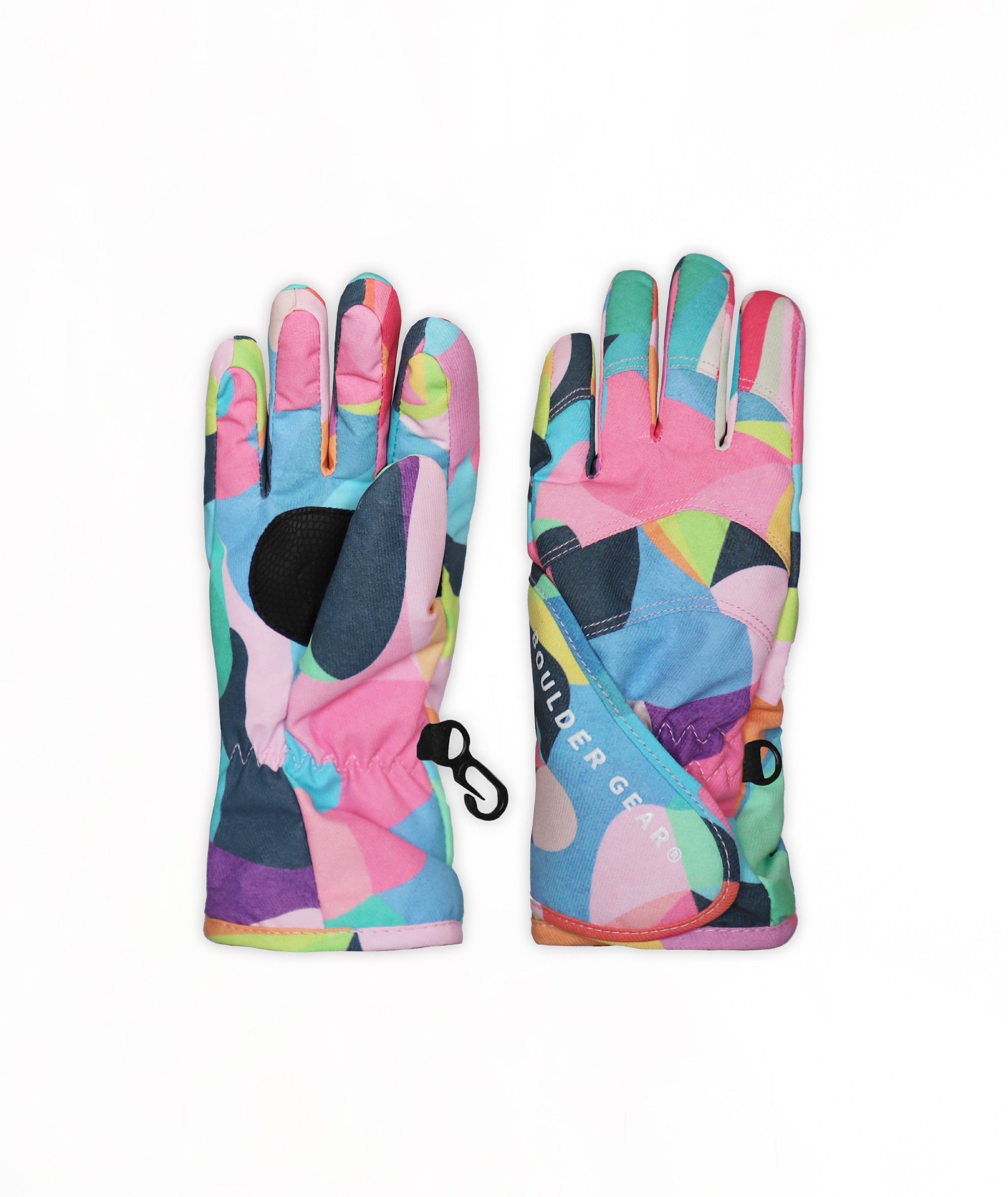 A pair of colorful ski gloves with a vibrant geometric patchwork pattern in pink, blue, green, and purple, displayed flat against a white background.