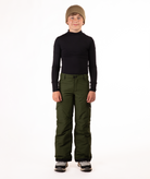 youth boy wearing a black long-sleeve shirt and green snow pants on a white background