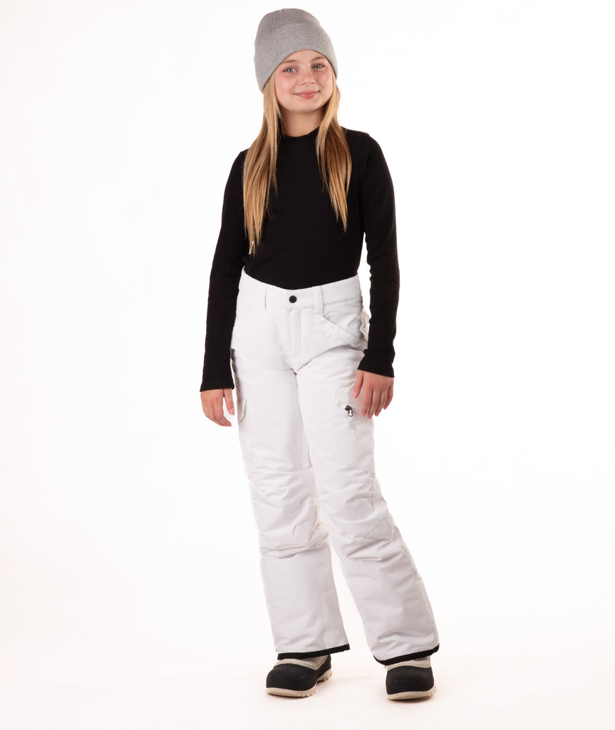 girl wearing white snow pants and a black long-sleeve top on a white background