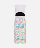 back of a multi colored abstract geometric kids snow bib with black accents on a white background