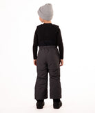 back of Child wearing dark gray snow bibs on a white background