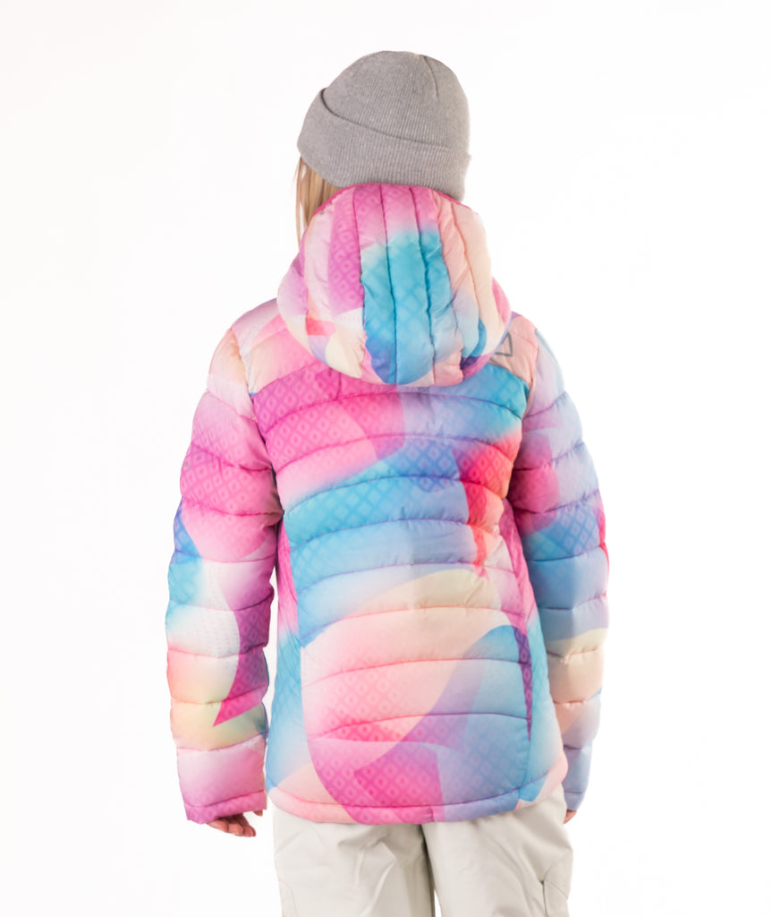 back of girl wearing a multi colored abstract pastel patterned  puffer jacket on a white background