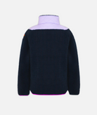 back of youth girls two toned fleece jacket in light purple and navy with bright purple hem on a white background