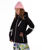 Youth girl wearing a black jacket with white accents on a white background