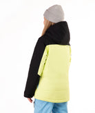 A model shown from the back wearing a color-blocked hooded jacket with a black upper section and a bright neon yellow lower section, paired with a gray beanie and light blue pants, against a plain white background.