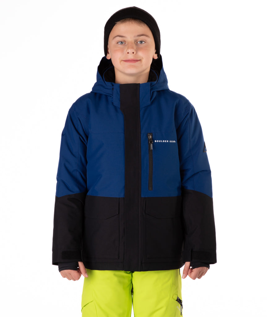 Youth Boy wearing a blue and black jacket with a visible brand logo on a white background