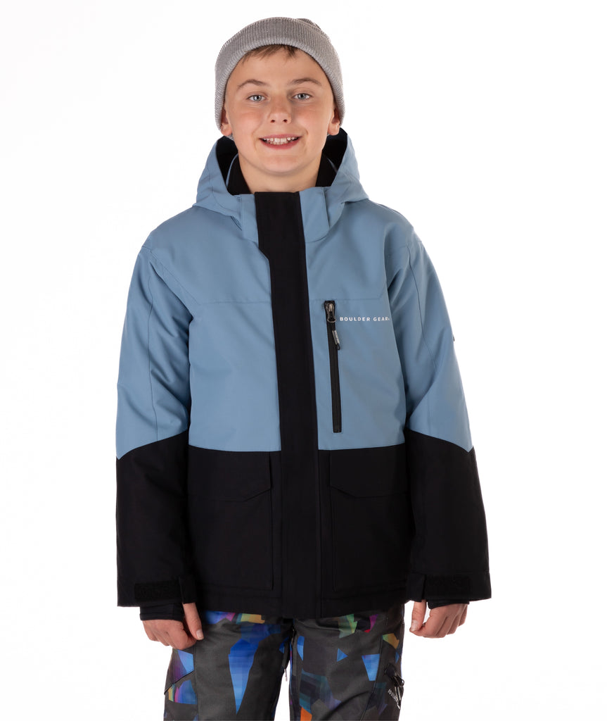Youth Boy wearing a blue and black jacket with a visible brand logo on a white background