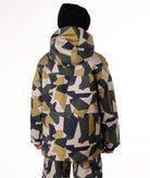Youth Boy wearing a camouflage-patterned winter jacket on a white background