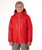 Youth boy wearing a red jacket with white zippers and a Boulder Gear brand logo on a white background