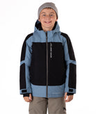 Child wearing a black and blue jacket with a visible Boulder Gear brand logo on a white background
