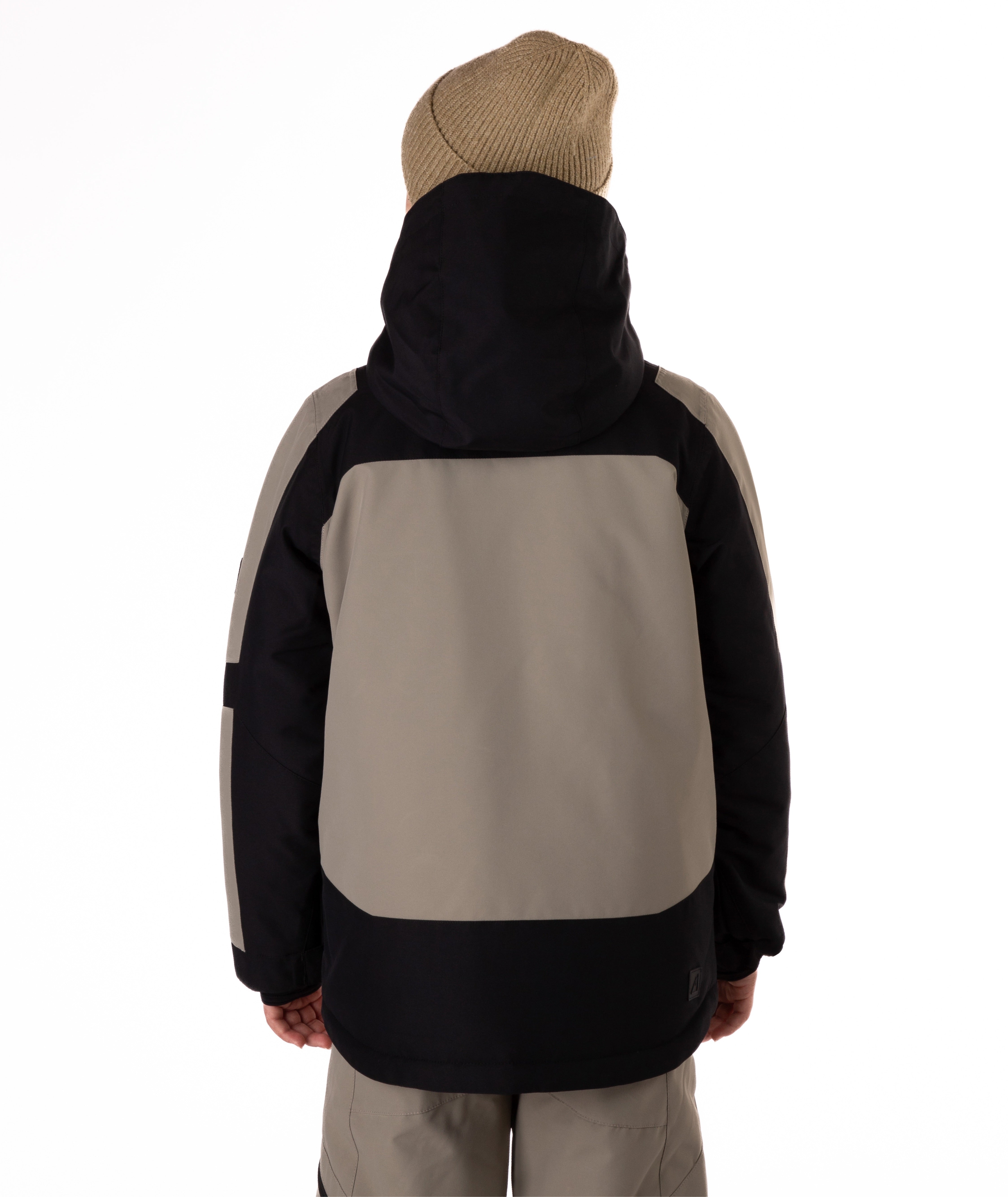 Back view of a child wearing a black and gray jacket on a white background