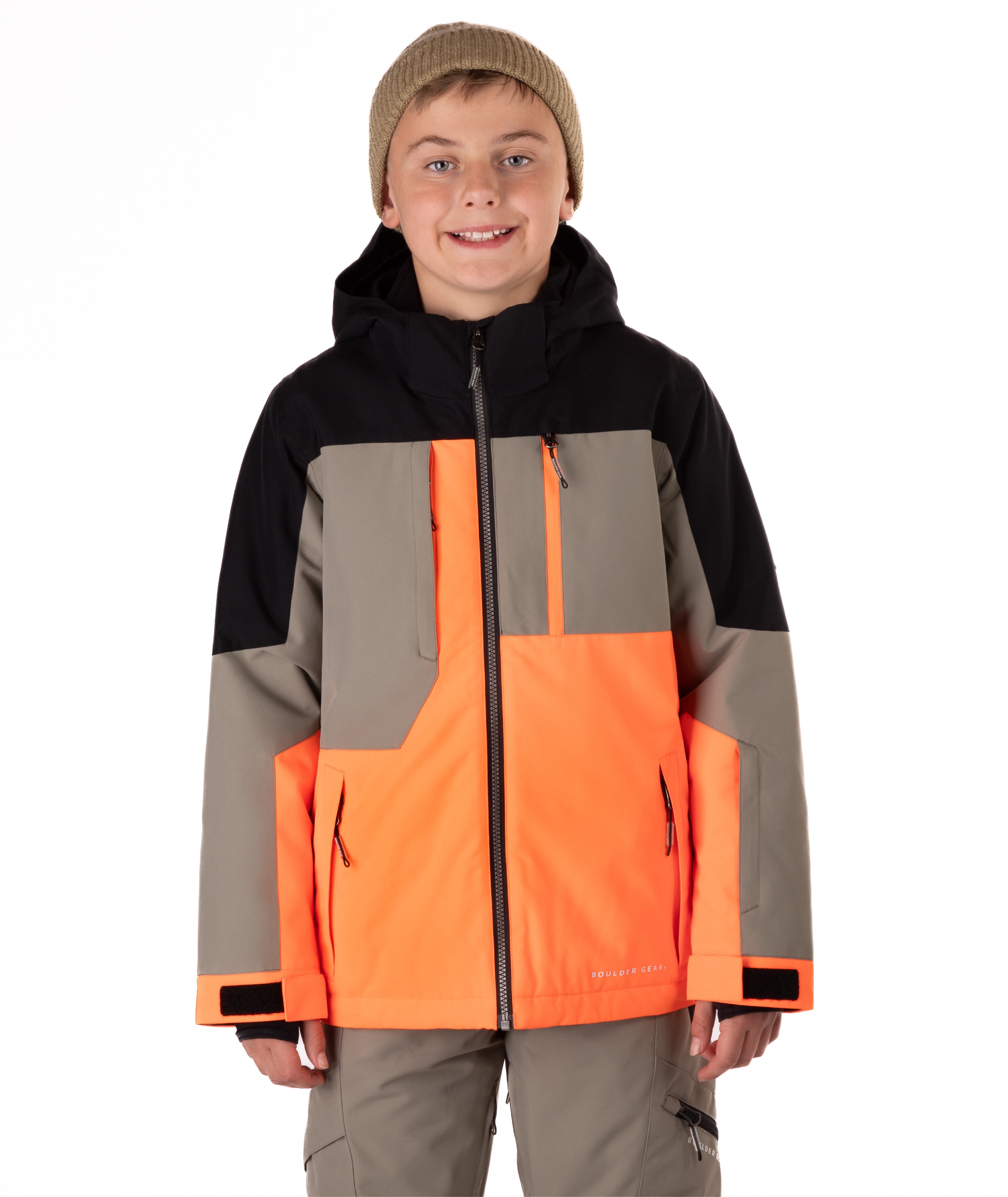 Youth boy wearing a black, orange, and gray jacket on a white background