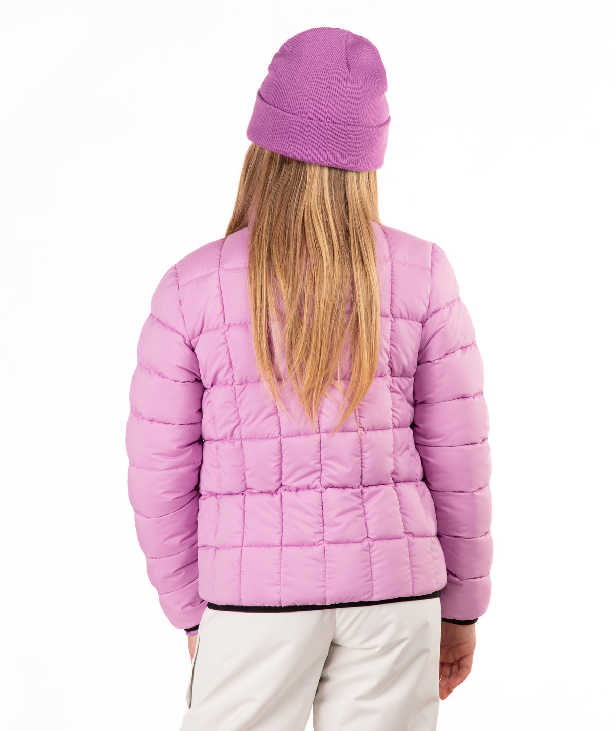 A child shown from the back wearing a light purple quilted puffer jacket, a matching beanie, and off-white pants against a plain white background.